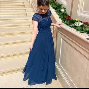 Azazie floor length navy blue bridesmaid dress.